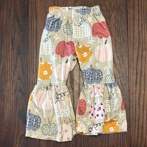 Marie Nicole pumpkin print flare pants